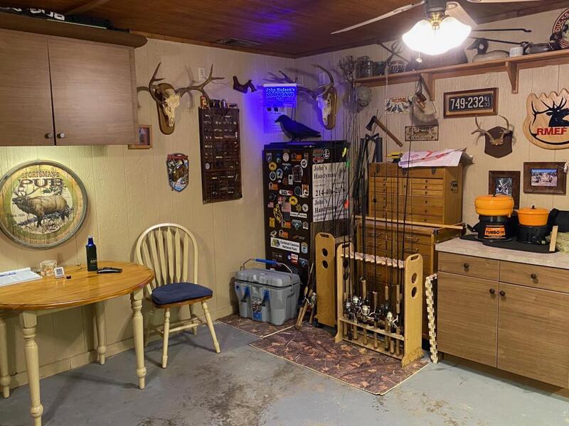 Fishing Man Cave/Garage in New House, plus some fishing pics! : r/garageporn
