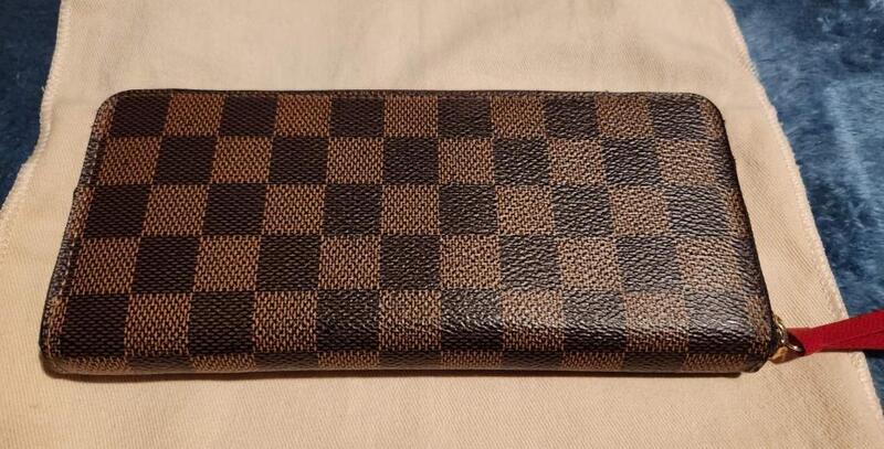 Don't forget your wife this Christmas buy her a Louis Vuitton Wallet!
